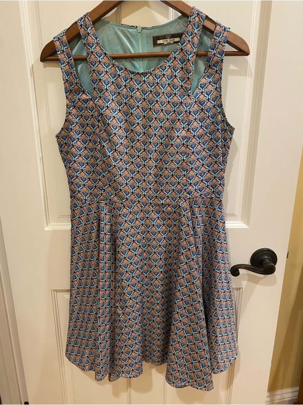 Boutique sleeveless mini dress with flouncy skirt, women’s M/L